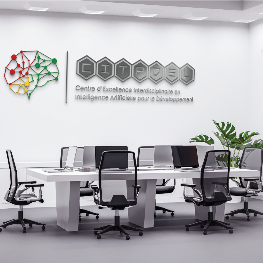 Modern research laboratory setting with diverse scientists working on advanced computing technology in a bright clean environment