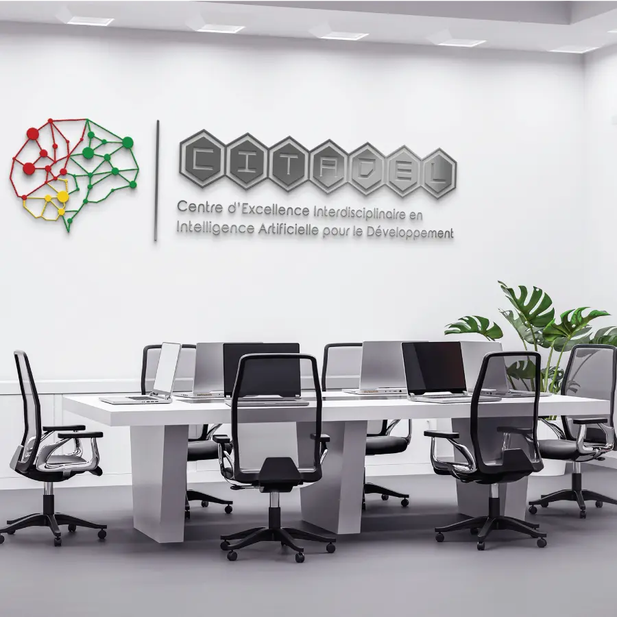 Modern research laboratory setting with diverse scientists working on advanced computing technology in a bright clean environment
